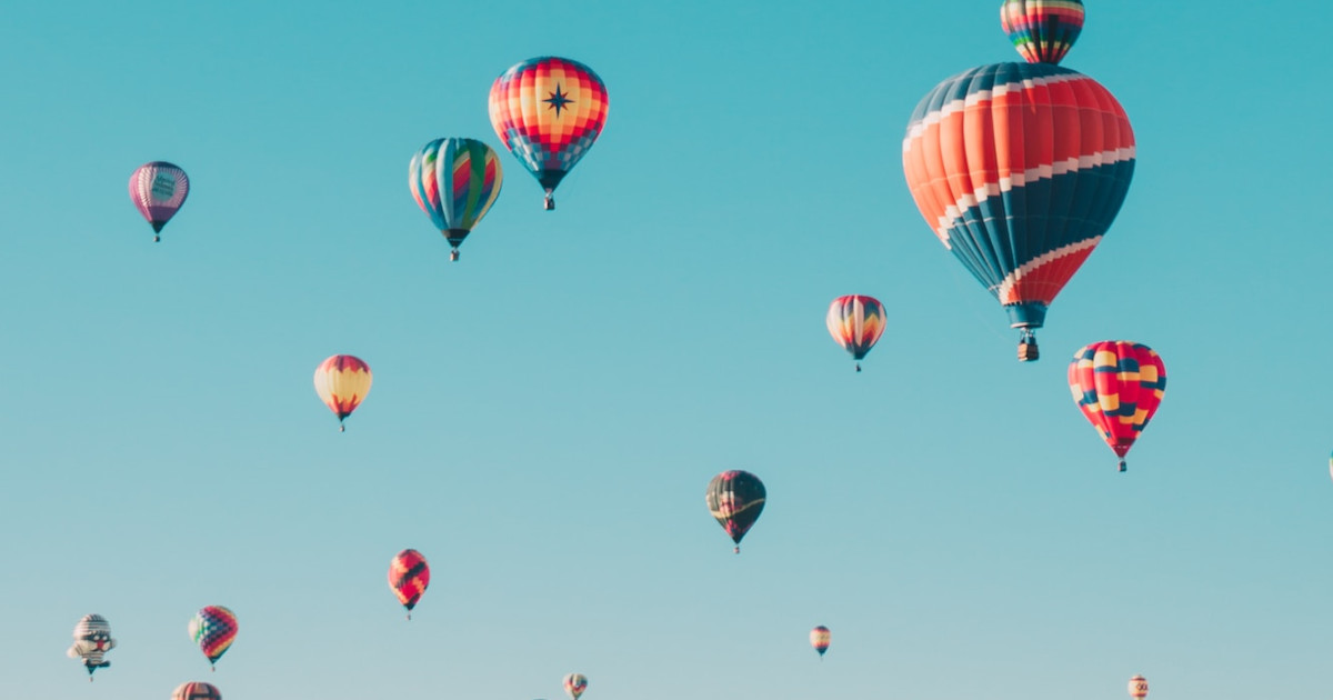 A sky full of hot-air balloons.