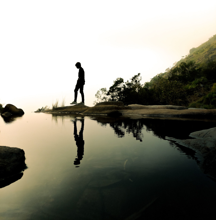 202608_stillness_silhouette_lake_white_crop_scale Stepping out into a calm and peaceful environment.